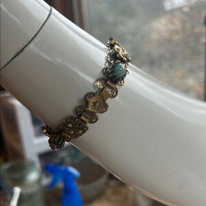 Gold and Silver Victorian-Inspired Bracelet with Ornate Design